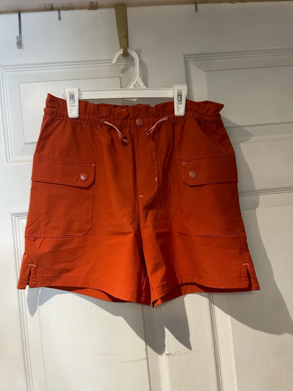 Women's Athletic Cargo Shorts in Bright Orange